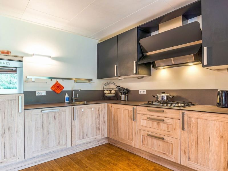 Detached Wooden Chalet With Sauna and Jacuzzi at the Nature Park Maashorst, Uden, Netherlands